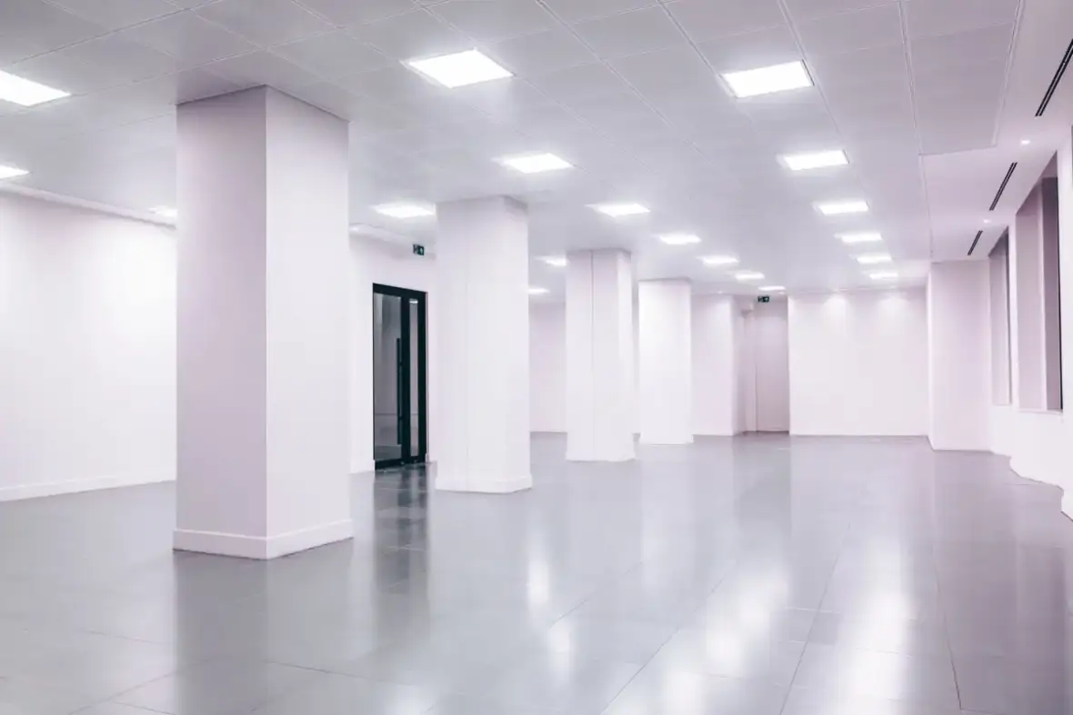 Finished office interior showing the even lighting that makes a mismatched repair visible