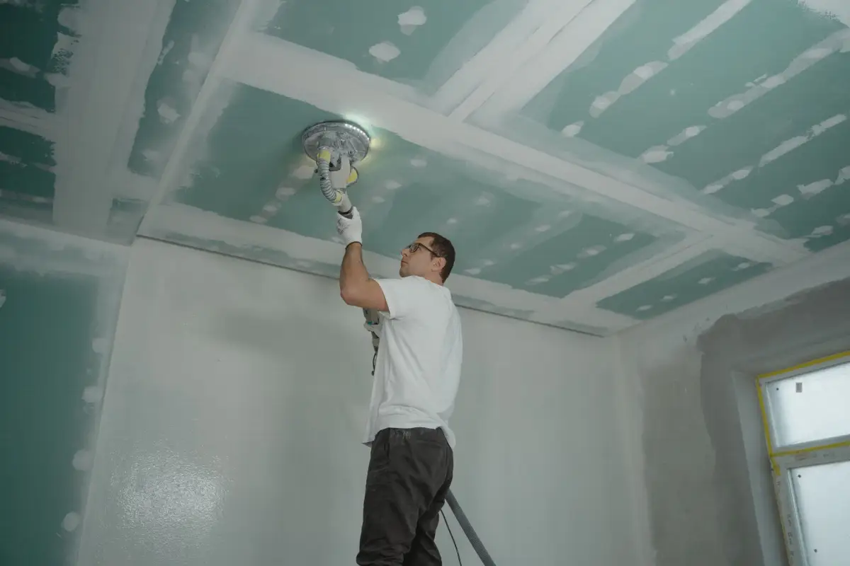 Drywall seams sanded smooth and checked under the room's own lighting