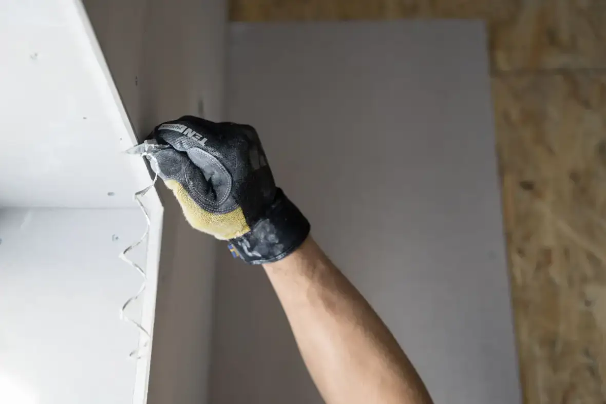 Joint compound applied over a drywall patch and feathered outward